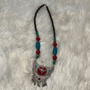 Vintage necklace with large bull pendant wood beads